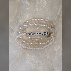 Be Strong Faux Pearl bracelets